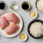 Ingredients for homemade Chicken Teriyaki: chicken thighs, soy sauce, mirin, sake, brown sugar, ginger, garlic, and rice.