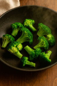 Steaming fresh broccoli until bright green for beef and broccoli stir fry. 🥦
