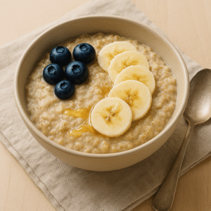 Blueberry oatmeal served in a bowl with fresh blueberries and almonds