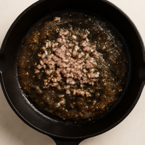 Steak Diane – minced shallots sautéing in butter in the same skillet after searing the steaks