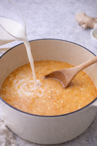 Coconut milk stirred into the soup until creamy.